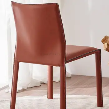 Işık lüks tasarımcı yemek masası ve sandalye italyan Minimalist eyer deri yemek sandalyesi ev Modern Minimalist Model odası