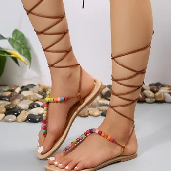 Yeni Roma Stil Yaz Kadın Sandalet Flats Topuk Düz Renk Çapraz bağlı Sandalet Moda Açık rahat ayakkabılar Gladyatör 34-43