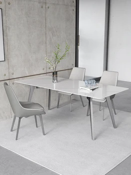 Kaya yemek masası 2021 Yeni İtalyan Aile Küçük Daire Basit Tasarımcı Dikdörtgen High-end yemek masası ve Sandalye Kombinasyonu